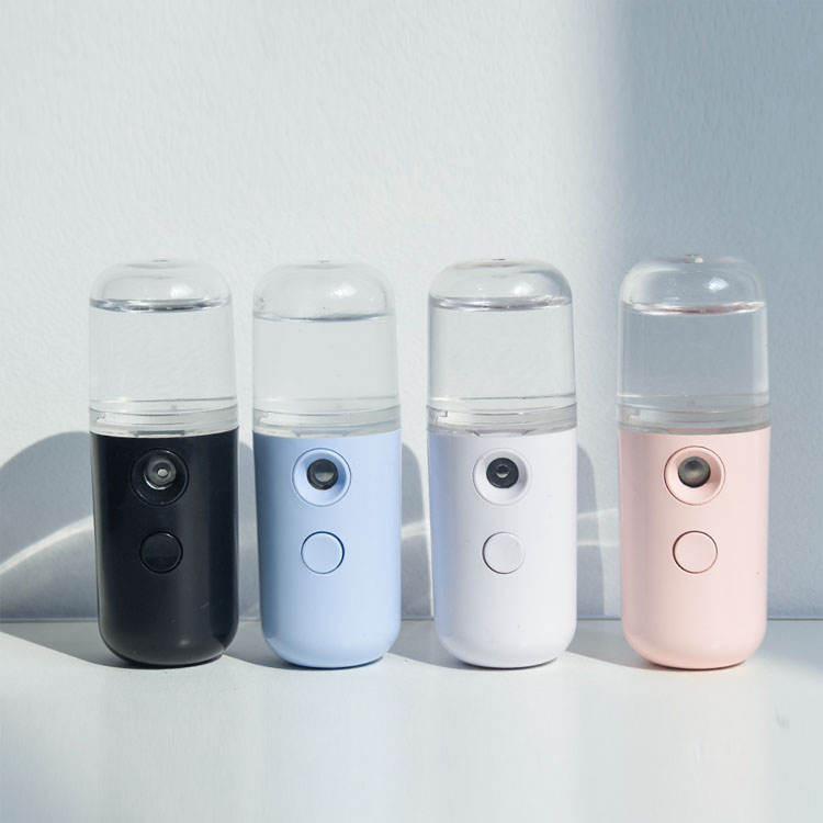  Amazon Mini portátil Handy Ion Desinfectar Vapor facial Vapor facial Vaporizador facial Nano Mist Rociador  
