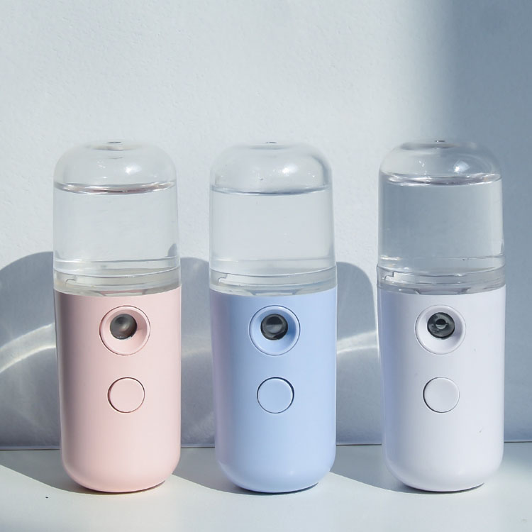 Amazon Mini portátil Handy Ion Desinfectar Vapor facial Vapor facial Vaporizador facial Nano Mist Rociador  